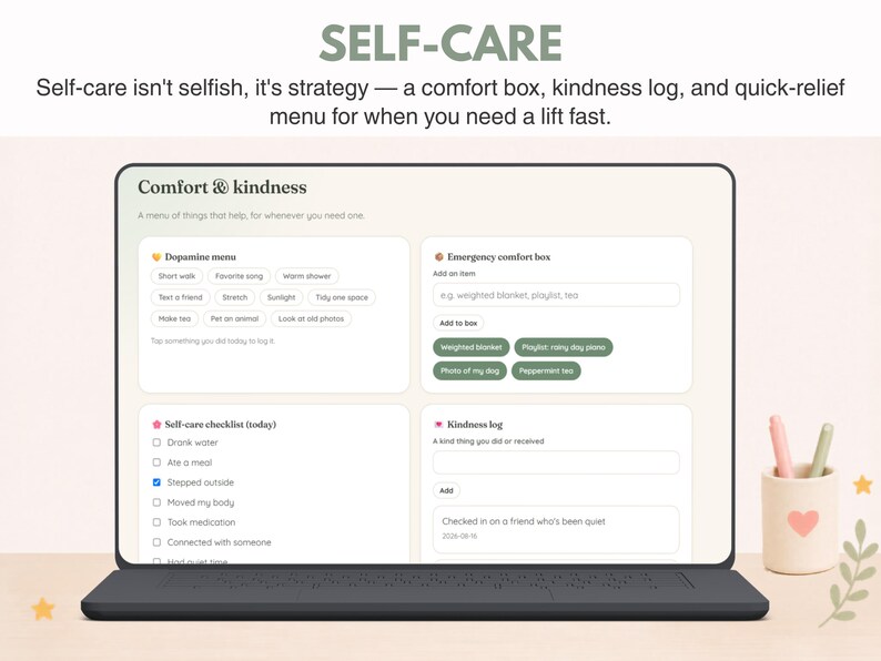 May include: A digital interface titled Comfort & kindness displayed on a laptop screen, featuring sections for a Dopamine menu, Emergency comfort box, Self-care checklist, and Kindness log. The screen includes text about self-care strategy.