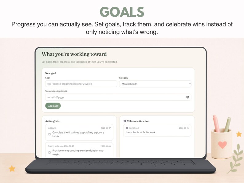 May include: A digital interface displayed on a laptop screen titled GOALS, featuring a section labeled What you're working toward. The screen includes input fields for a new goal, category, and target date, alongside sections for active goals and a milestone timeline.