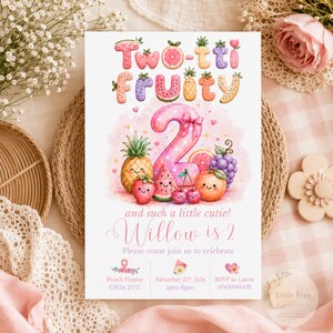 May include: A birthday invitation card featuring the text Two-tti Fruity and Willow is 2. The design includes watercolor illustrations of a large pink number 2 surrounded by smiling fruits like pineapples, strawberries, grapes, and cherries.