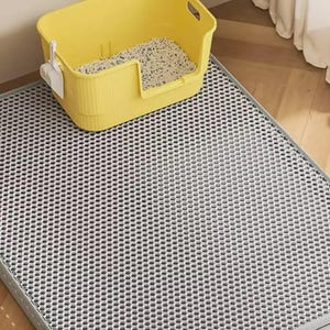 Extra Large Cat Litter Mat, waterproof double layer litter catcher mat designed to trap cat litter, sand, and debris. Durable honeycomb litter trapping surface collects scattered litter from cat paws while the waterproof bottom layer protects hardwood, tile, laminate, and carpet floors. Non-slip washable cat mat made from soft EVA material for maximum comfort and easy cleaning. Ideal litter box mat for indoor cats, multi-cat homes, pet own