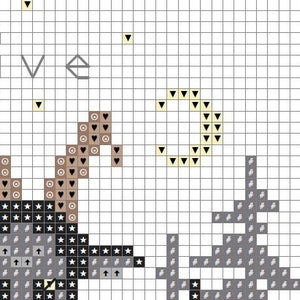 May include: Cross stitch pattern featuring a black and white illustration of a deer with antlers, a crescent moon, and the word "live".