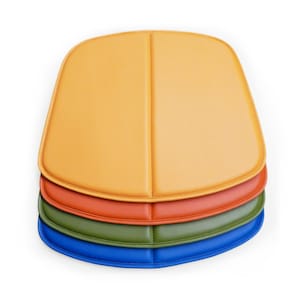 May include: Four chair seat cushions in different colors: orange, red, green, and blue. The cushions are stacked on top of each other.