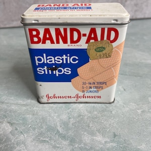 May include: A set of three ceramic vases in varying heights. The vases have a matte finish in shades of cream, beige, and brown. The tallest vase is approximately 10 inches high.