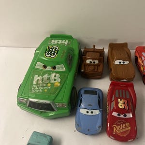 Lote de 12 coches de juguete de metal fundido a presión de Disney Pixar Cars: Lightning McQueen, Dinoco 43 imagen 2
