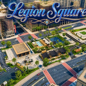 Puede incluir: Una vista aérea de una plaza urbana llamada Legion Square, que presenta un área de parque central con palmeras, una piscina, asientos al aire libre con toldos negros, senderos pavimentados, edificios de varios pisos y calles con coches.