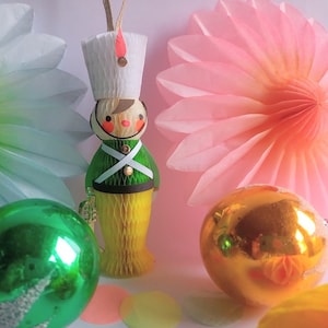 Vintage-style Christmas honeycomb soldier/ band ornament