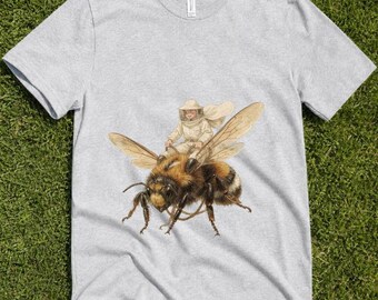 Whimsical Bee Rider T-Shirt, Vintage Beekeeper on Bumblebee Art, Cottagecore Nature Lover Tee, Unique Gift for Gardeners & Fantasy Fans