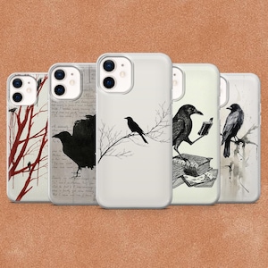 May include: Five clear smartphone cases featuring black crow illustrations. Designs include a red tree, a crow over handwritten text, a crow on a bare branch, a crow reading a book on a stack of books, and a crow perched on a branch with ink splatters.