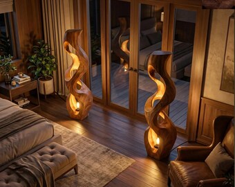 Lámpara de pie de madera hecha a mano, forma escultural y fluida, iluminación minimalista japonesa.