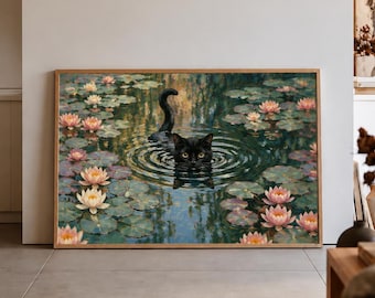 May include: A rectangular framed wall art print featuring a black cat swimming in a pond filled with green lily pads and blooming pink and white water lilies. The cat is centered in the water, creating circular ripples around its head.