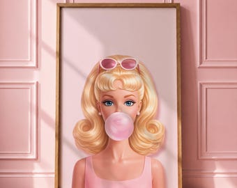 May include: A framed wall art print featuring a stylized illustration of a blonde person with voluminous hair, wearing pink sunglasses on their head and a pink top, while blowing a large pink bubblegum bubble against a solid light pink background.