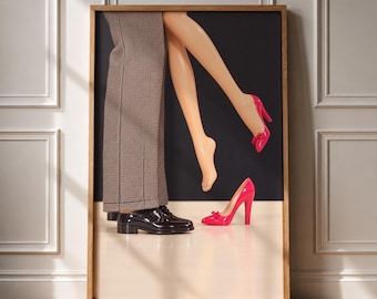 May include: A framed wall art print featuring a pair of legs in light-toned skin wearing bright pink high-heeled pumps with bows, positioned next to a pair of legs in brown houndstooth trousers and black leather dress shoes on a two-tone background.