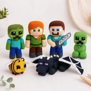 May include: A collection of six crocheted figures inspired by Minecraft characters, including a green zombie, a character with orange hair, a character with brown hair holding a grey sword, a small green creeper, a yellow bee, and a black dragon.