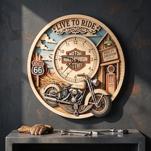 May include: A circular wooden wall clock featuring a layered 3D design with a Harley-Davidson motorcycle, a Route 66 sign, a gas pump, and the text LIVE TO RIDE. The clock face displays the Harley-Davidson logo with black hands and numerals.