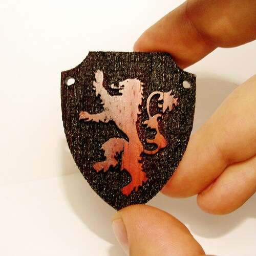 Game of Thrones Lannister Lion Pendant from exotic wood Paduk.