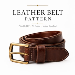May include: A coiled brown leather belt with visible stitching and a brass-toned metal buckle. The text above reads LEATHER BELT PATTERN, Printable PDF, A4 Format, Instant Download. The belt features a pointed tip and a single leather keeper loop.