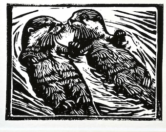 Otters holding hands linocut block print sea otter