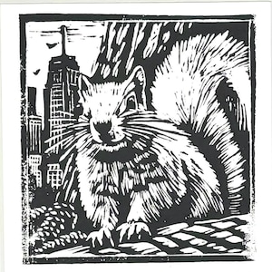 May include: Black and white woodcut print of a squirrel in a city setting. The squirrel is facing the viewer with its tail behind it. The background shows a cityscape with tall buildings.