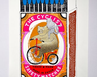 Bear on a bike matchbox - Very Big Cyclist's Burden