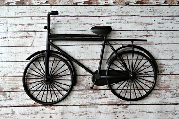 hanging bike on wall for decoration