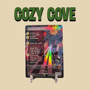 May include: A holographic trading card titled Summon: Bahamut featuring a dark, intricate illustration of a dragon breathing a rainbow-colored beam. The card text details game mechanics including Mega Flare, and the words COZY COVE appear above.