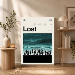 May include: A rectangular wall art print featuring a minimalist design for the television show Lost. The poster displays the title Lost in bold black text, a list of cast members, and a dark, moody image of a group of people on a beach.