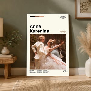 May include: A vertical rectangular poster featuring the title Anna Karenina in bold black text. Below the title is a photograph of a couple dancing in formal attire. The poster includes the director's name, cast list, and the number 12.