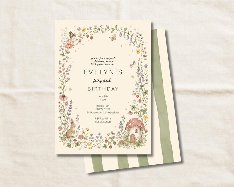 May include: A cream-colored birthday invitation card featuring a floral border with a fairy, a rabbit, and a mushroom house. The text reads: Join us for a magical celebration as our little fairy turns one, EVELYN'S fairy first BIRTHDAY, July 8th, 11 AM, Trolley Park, 501 W 6th St, Bridgetown, Connecticut, RSVP to Nina, 456.746.5590.