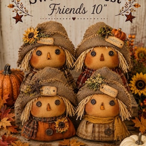 May include: Four 10-inch scarecrow dolls with burlap hats, button eyes, and triangular noses. Each hat features a small wooden sign reading BLESSED, HARVEST, FALL Y'ALL, or AUTUMN. The dolls wear plaid or solid fabric outfits with sunflower and berry accents.