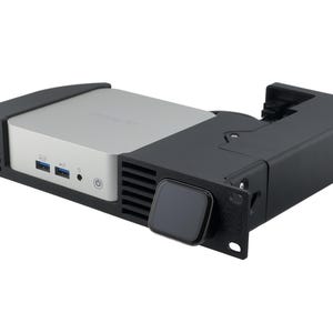 May include: A black metal rack mount bracket holding a silver compact computer. The bracket features side ventilation slats, a front-facing power button, and a small square display screen. The computer has two blue USB ports and a headphone jack visible.