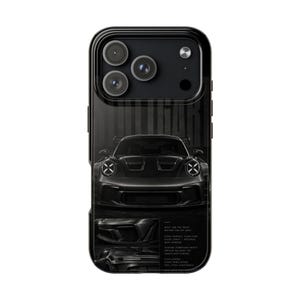 May include: A black smartphone case featuring a high-contrast graphic of a sports car. The design includes a front-facing view of the vehicle, two smaller detail shots, and white text that reads: Built for the track, refined for the road.
