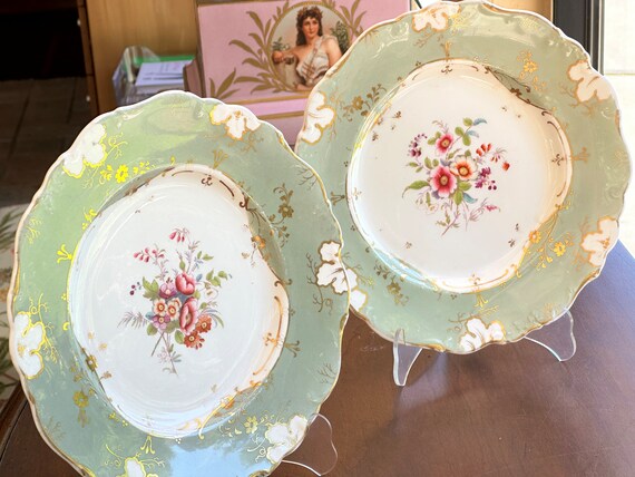Rare Pr Antique Coalport Botanical Dessert Plates w Soft Muted Green Border Hand Painted Flora Gilded Scalloped Rims Early 19th Century