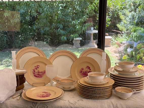Assembled Peach and Rose Pink Dinner Plates: Gilt Rims 32 pieces