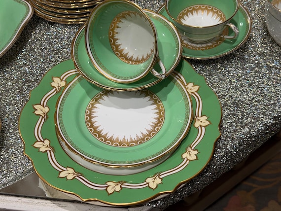 33Pc Antique Tuscan Green Tea Set w Cake Plate, Waste Bowl, 8 Teacups, 11 Saucers, 12 Dessert Plates, Circa 1920