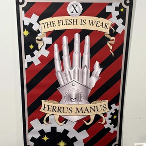 May include: A vertical fabric banner featuring a silver mechanical hand centered over a red and black diagonal striped background. The text reads THE FLESH IS WEAK and FERRUS MANUS. It includes gear motifs, a skull emblem, and three lower pennants.