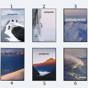 May include: A collection of six rectangular posters featuring the Patagonia logo and various outdoor scenes including snowy mountain peaks, a climber on an ice wall, a vast mountain range, a desert landscape, a sunset valley, and a large ocean wave.