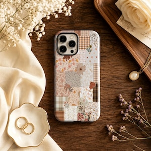 May include: A rectangular smartphone case featuring a multi-patterned collage design. The surface displays various squares and rectangles with prints including brown and white gingham, small floral motifs, autumn leaves, plaid, and solid neutral tones.