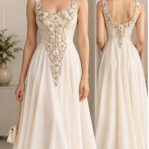 May include: An ivory high-low dress featuring a square neckline and thick straps adorned with floral embroidery and beadwork. The text reads: From Sketch to Style, Traditional Motifs Reimagined in a Modern Western Dress.
