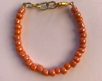 Orange stackable baby or toddler bracelet