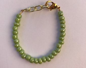 Green beaded stackable baby or toddler bracelet