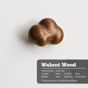 Peut inclure: Un bouton de meuble en bois de noyer brun fonc&eacute; avec une forme arrondie rappelant un nuage et un grain de bois visible. Le texte indique : Walnut Wood, Hole Spacing: Single Hole, Length: 54mm, Width: 35mm, Height: 29mm, Material: Walnut Wood.
