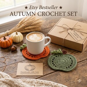 May include: A set of pumpkin-shaped crochet coasters in orange and green, a white ceramic mug with latte art, a brown cardboard gift box with twine and a tag reading The Pumpkin Patch Coaster Set, and a card reading Handmade with Care.