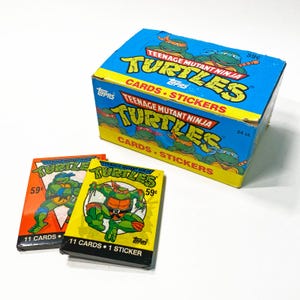Paquetes de cartas y pegatinas selladas de las Tortugas Ninja de Topps, 1990, caja completa de 24 unidades