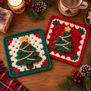 May include: Two square crochet coasters featuring a central green Christmas tree with a yellow star, red ornaments, and a brown trunk. One coaster has a cream and green border, while the other has a cream and red border with green accents.
