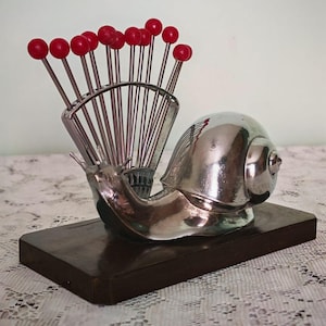 French Art Deco Chrome Snail Cocktail Pick Set | 12 Red Bakelite Ball Picks on Wooden Base | 1930s Barware, Benjamin Rabier inspired