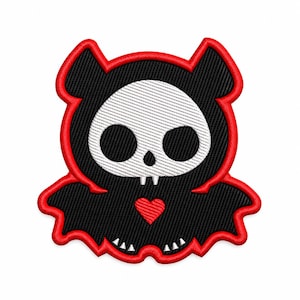 May include: An embroidered patch featuring a stylized character with a white skull head, black hood, and black bat-like wings. The design includes a small red heart on the chest, two white fangs, and a vibrant red border outlining the entire shape.