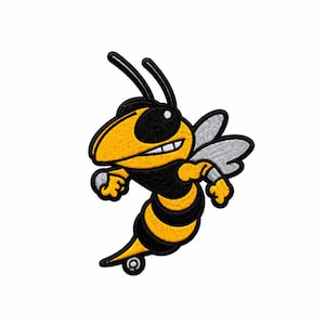 May include: An embroidered patch featuring a cartoon hornet with a yellow head, black eye, and a yellow and black striped body. The hornet has two antennae, white wings, and is depicted in a dynamic, forward-leaning pose with a black border.