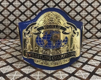 Réplica del cinturón de campeón de lucha libre de peso pesado por parejas de la NWA, tamaño adulto.