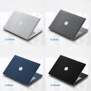 May include: Four Dell laptops shown in a grid, each with a brushed metal texture finish. The colors are labeled as 1.silver, 2.gray, 3.blue, and 4.black. Each laptop is partially open, revealing a portion of the keyboard and the Dell logo on the lid.