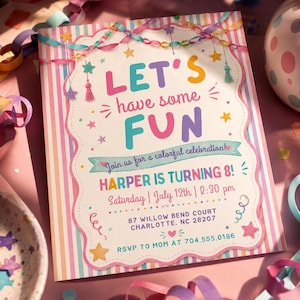 May include: A rectangular party invitation card with a pastel striped border. The center features the text LET'S have some FUN, Join us for a colorful celebration!, HARPER IS TURNING 8!, Saturday | July 12th | 2:30 pm, 87 Willow Bend Court, Charlotte, NC 28207, RSVP TO MOM AT 704.555.0186, decorated with colorful stars, streamers, and tassels.